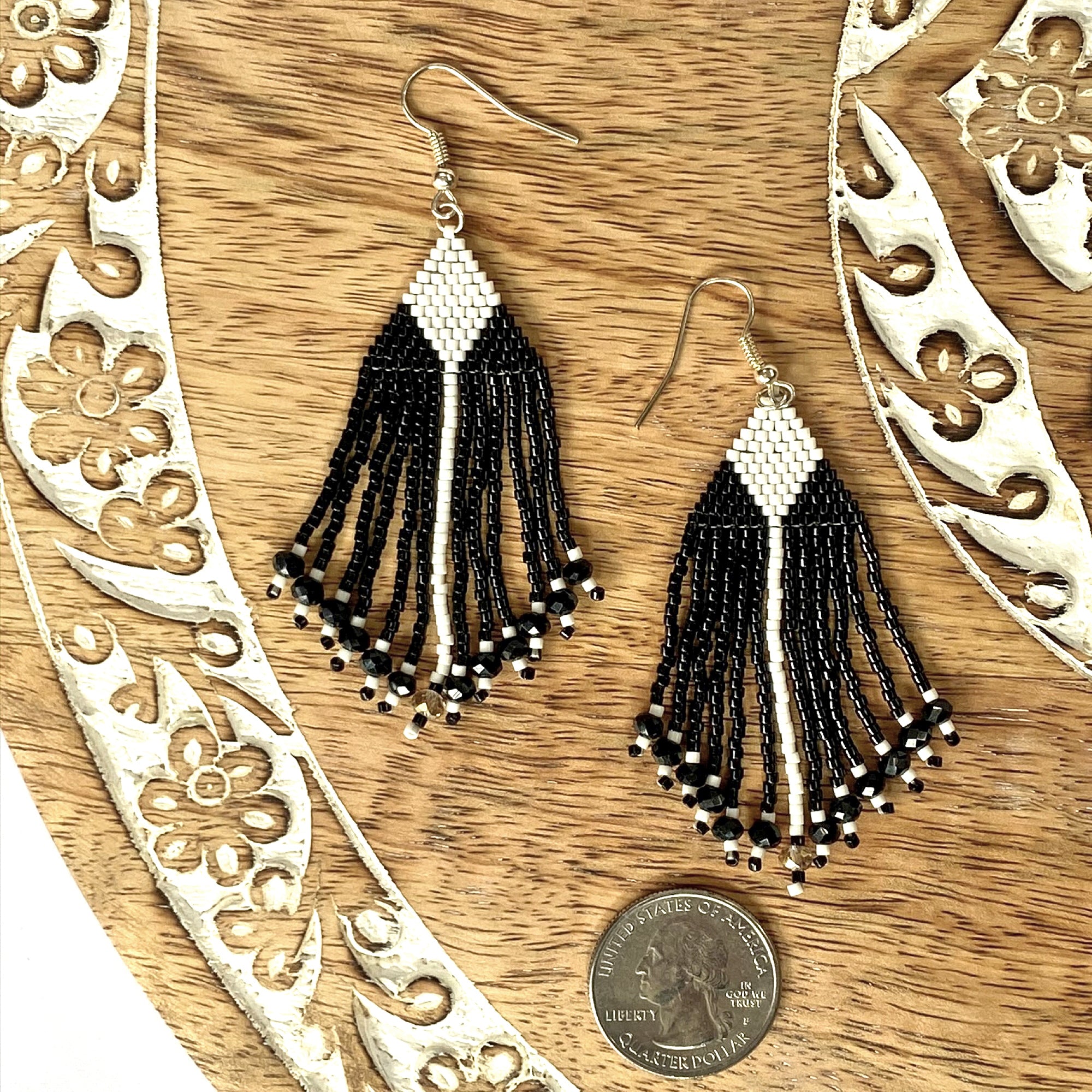 hand beaded black and white delica fringe earrings with geometric triangle and diamond design and swarovski crystals