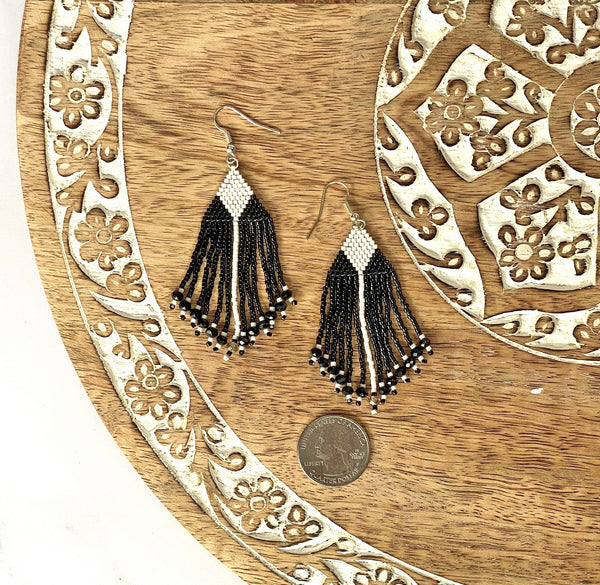 hand beaded black and white delica fringe earrings with geometric triangle and diamond design and swarovski crystals