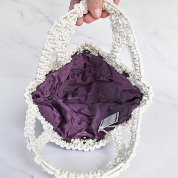 handmade macrame handbag intricate diamond pattern deep purple accent fully lined